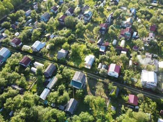 Как определить размер взносов при владении двумя участками